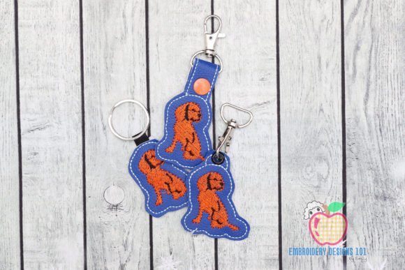 An Embroidery Designer’s Look at the Brown Dog Sitting Keyfob