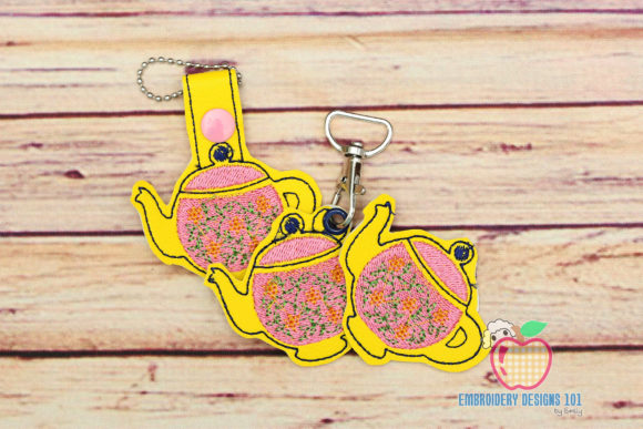 Ceramic Teapot Keyfob: A Charming Embroidery Design
